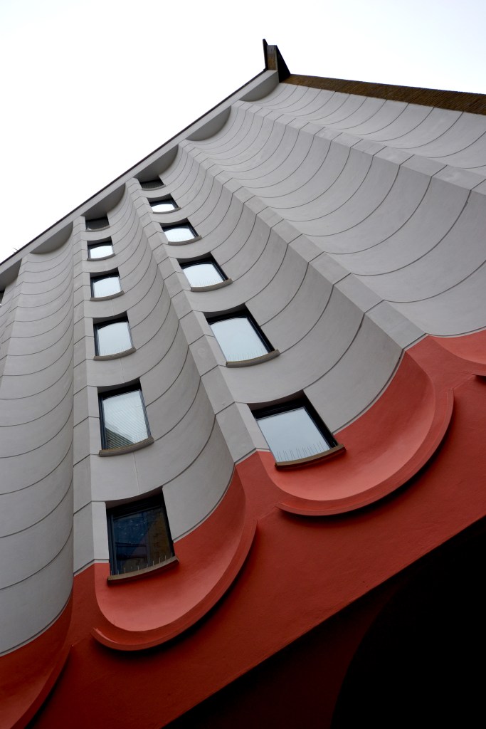 Grey and red building