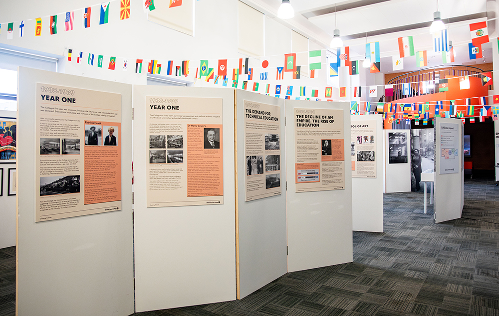 Photo of the first four panels of the exhibition.